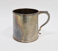 George V silver christening mug, Birmingham 1934, William Suckling, of tapered form with ribbed