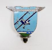 Brooklands Aero-club enamel car mascot depicting a bi-plane in flight, stamped to reverse Spencer,