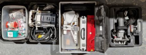 Cased Trend T11 electric router and a Trend T20 biscuit jointer, several cases of router bids, a