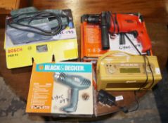 Various tools including a Bosch PSS23 orbital sander, a Black & Decker CD70 CRE hammer drill and a