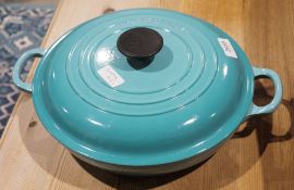 Light blue glazed cast iron twin-handled and lidded Le Creuset shallow casserole pot, 26cm