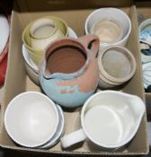 Assorted ceramics including various water jugs, flower vases, a large turned wooden candlestick, two