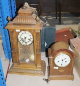 Late 19th century Vienna-style clock, with carved domed case, three glazed panels, the enamelled