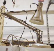 Brown painted anglepoise adjustable lamp, a black uplight and reading lamp and a white painted