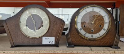 Two mid-century Smiths oak cased chiming mantel clocks, each of arched rectangular form, one with