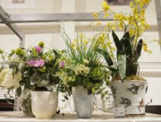 Collection of faux-floral arrangements contained within various pots and vases to include a