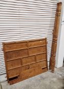 Wooden carved bed headboard, 112cm high x 130cm wide together with pair of carved wooden columns,