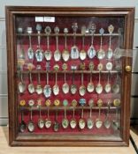 Cased collection of silver-plated and white metal souvenir spoons, including a 1977 Silver