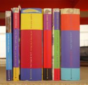 Six copies of Harry Potter by JK Rowling, including the Philosophers Stone, Bloomsbury 1997, the