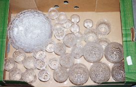 Quantity of glassware including four etched cordial glasses, graduating set of cut glass dishes