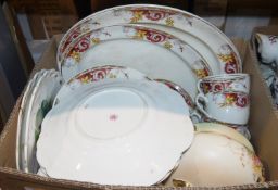 Daffodil and acanthus decorated part dinner and tea service to include service plates, teacups, etc,