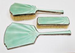 Art Deco silver and green guilloche enamel three-piece dressing table set, Birmingham 1933,