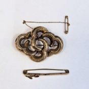 9ct yellow gold bar brooch set with two rubies, 4.7cm long, approximate weight 1.1 grams and a