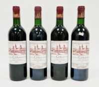 Four bottles of Chateau Cos d'Estournel Grand Cru Classe St Estephe (two of 1984, two of 1986) (