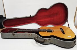 Goya G-10 acoustic guitar, serial no.386, six strings, 96cm long with spare strings, two Capos