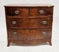 Early 19th century mahogany bowfronted chest of two short and two long cockbeaded drawers with brass