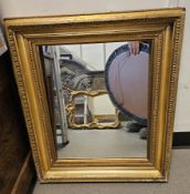Gilt-framed rectangular mirror with moulded and beaded edge, 67cm x 58cm and two 20th century