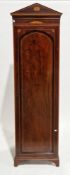 Edwardian inlaid wardrobe in the form of a sentry box, the single panel door opening to a hanging