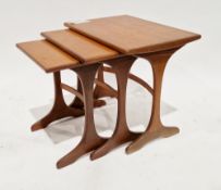 Nest of three G-Plan Fresco Range tables, the rectangular tops over trestle-style legs united by