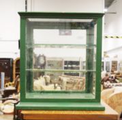 Early 20th century counter-top shop display cabinet, green painted metal frame with glazed panels to