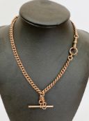 9ct rose gold gold albert pocket watch chain with T-bar, stamped 375 and 9, 40.2 grams  Condition