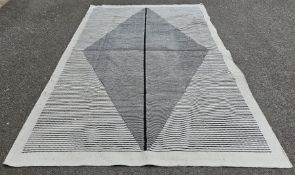 Large modern cream ground rug with large striped lozenge medallions, on striped field, 293cm x 198cm