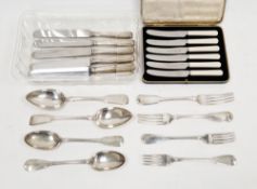 Four white metal spoons and four white metal forks, all with various hallmarks, possibly Russian