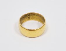 22ct yellow gold wedding band, of plain wide form, size L 1/2, approximate weight 7.1 grams