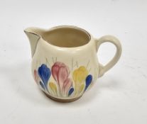 Clarice Cliff Newport Pottery Crocus pattern milk jug, circa 1930's, printed gilt and green