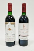 Bottle of Grand Vin de Chateau Latour premier grand cru classe 1984 Pauillac and a bottle of 1985