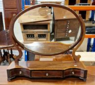 Edwardian mahogany crossbanded swing dressing mirror, the oval mirror supported on a serpentine