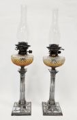 Victorian pair of silver column oil lamps, Sheffield 1898, Hawksworth, Eyre & Co Ltd, having hobnail