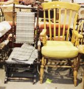 Windsor lathback beech and elm elbow chair on turned baluster legs united by two stretchers, 119cm