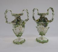 Pair of English porcelain Coalbrookdale two-handled rocaille flower-encrusted vases, circa 1835,