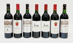 Two bottles of Chateau Lagrange Saint Julien grand cru classe 1986, two Chateau Langoa Barton 1985