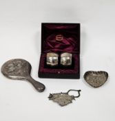 Collection of silver items including a Victorian Madeira decanter label of pierced foliate design,