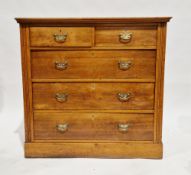 Late Victorian/Edwardian walnut chest having two short over three long drawers with brass drop