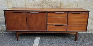 Mid-century teak sideboard by Morris of Glasgow, comprising an arrangement of three drawers and