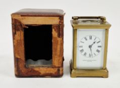 Early 20th century French eight-day striking brass cased carriage clock, the enamel dial with