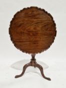 George III mahogany tilt-top table, the circular top with piecrust moulded edge, on a turned tapered