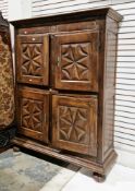 17th/18th century oak and walnut cupboard with moulded cornice, panelled sides and four cupboard