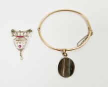 Art Nouveau brooch, the yellow and white metal mount (tests as gold) set with rubies, seed pearls