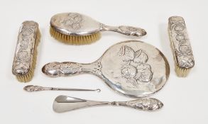 Edwardian silver assembled six-piece dressing table set, hallmarked Chester and Birmingham, circa