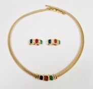 Christian Dior gold tone necklace and matching clip-on earring set, each piece set with a blue,