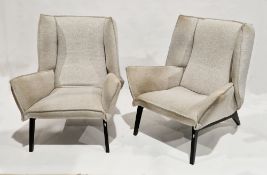 Pair of contemporary wingback armchairs by Ligne Roset upholstered in a cream tweed fabric, on an
