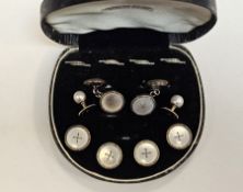 Early 20th century rhodium plated sterling sliver and mother of pearl dress studs and cufflink
