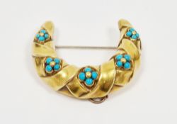 19th century gold and turquoise crescent brooch having ribband decoration interspersed with five