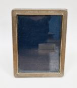 Elizabeth II silver mounted photograph frame, with engine turned border and inscription Lainston