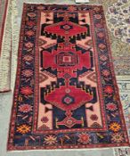 Large Eastern midnight blue ground rug with central geometric design, multiple geometric borders,