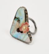 Silver and 18k yellow gold mounted boulder opal ring, the heart shaped boulder set with a moving